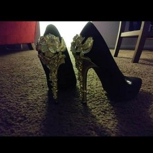 Black and gold heels
